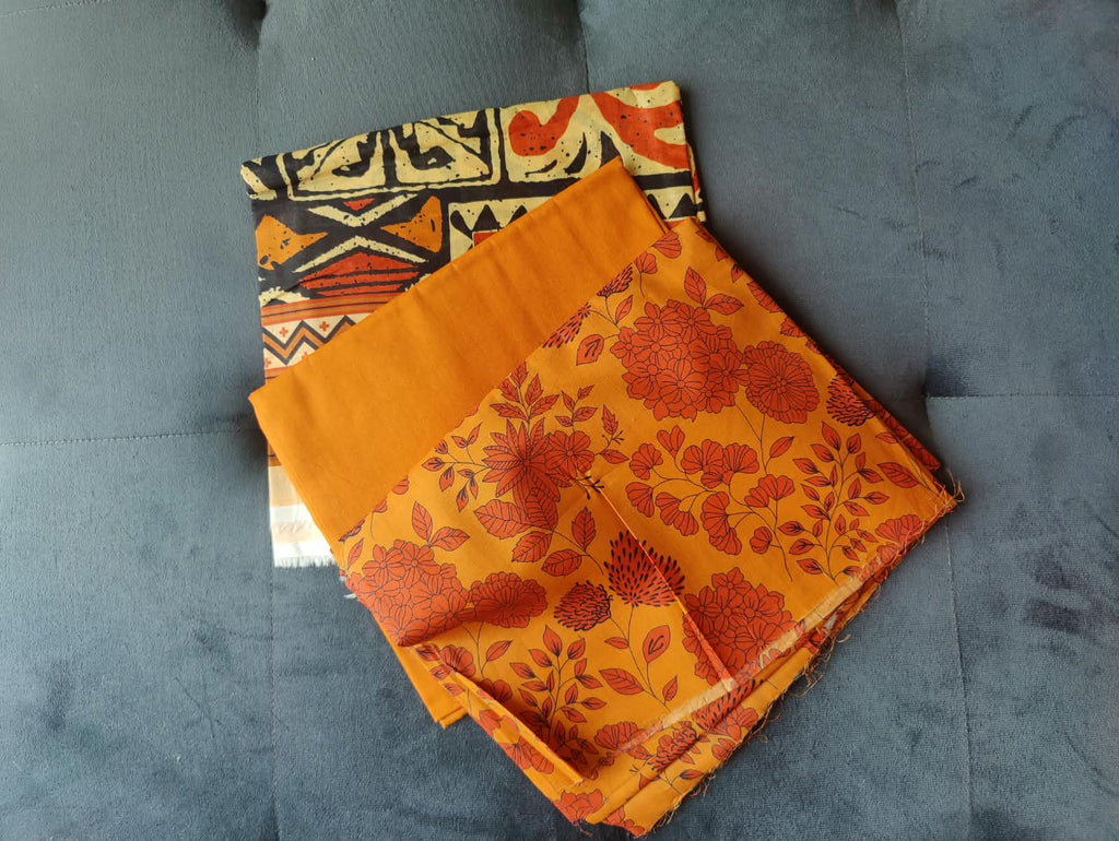 Sapphire Day to Day fabric close-up – orange floral lawn and printed dupatta