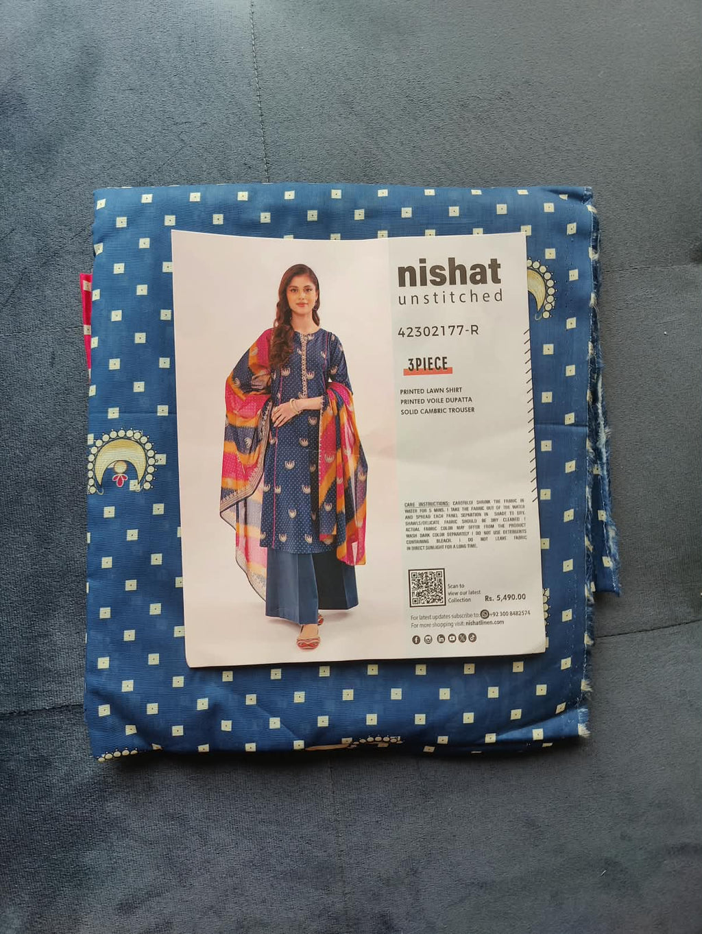 Nishat Unstitched 3-Piece Suit 42302177-R packaging – blue peacock print