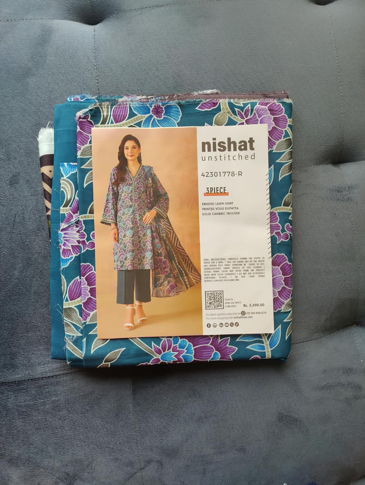 Nishat Unstitched 3-Piece Suit packaging with label