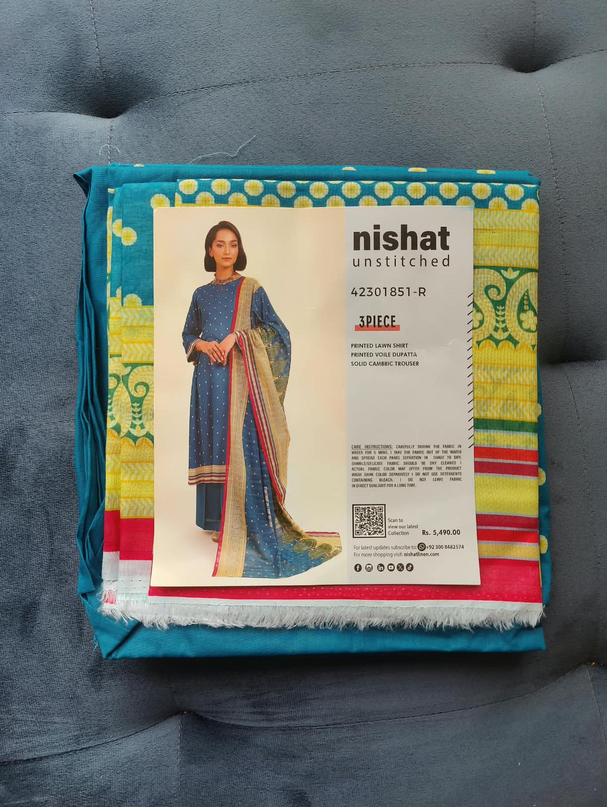 Nishat Unstitched 3-Piece Suit 42301851-R packaging – teal polka dot